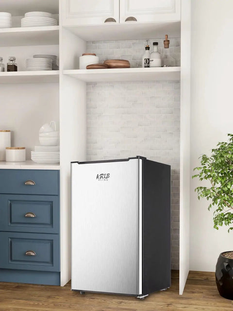 Solid 3.2 Cu Ft Upright Mini Freezer With No Stress Adjustable Thermostat And Removable Shelves For Dorm Office Kitchen Or Bedroom Smooth Chill Stash Setup In Fresh Silver in a modern kitchen setting.