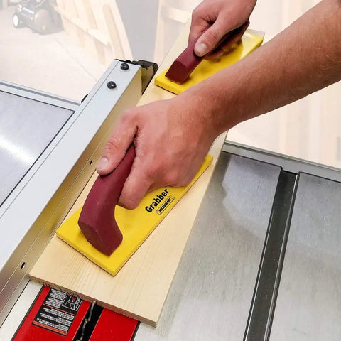 Pushblock for Table Saws and Router Tables with Diamond Grip and Non Marring Rubber Bottom Ergonomic Comfort Handle Built Tough Workpiece Holder in use on saw