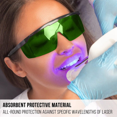 Person wearing Laser Safety Glasses For IPL 200 To 2000 Nm Eye Protection For Laser Hair Removal And Engraving UV400 Blocking OD4 Plus Fifteen Percent Visible Light Transmission Broad Spectrum Shield PC Material Comfy Fit Green Lens during dental procedure