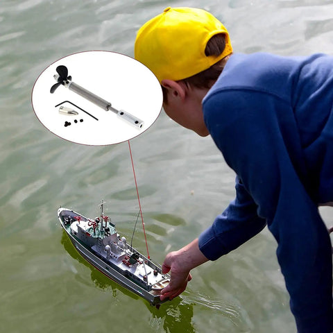 Child launches RC boat, inset shows Beefed Up RC Boat Drive Shaft Propeller Kit With 25cm Shaft And 20cm Sleeve, 36mm Prop