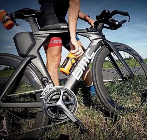 Cyclist with Triangle Bicycle Frame Bag Ride Ready For MTB And Road Bikes Lightweight Carbon Fabric Pouch with Universal Mounting Straps.