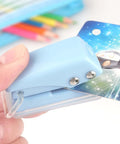 Three Piece Mini Hole Puncher Set With Six Sheet Capacity Each for ID cards and crafts, blue puncher in use