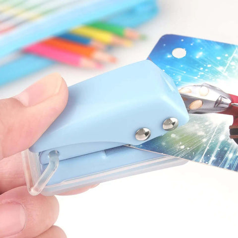 Three Piece Mini Hole Puncher Set With Six Sheet Capacity Each for ID cards and crafts, blue puncher in use