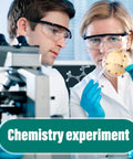 Scientists conducting a chemistry experiment with petri dish under microscope in lab