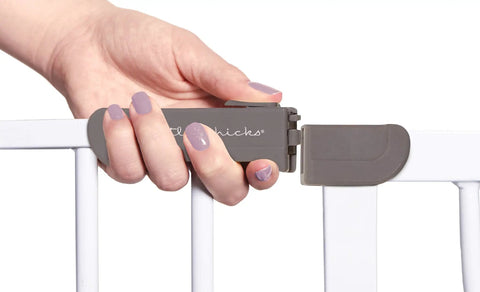 Hand operating latch on Walk Through Baby Safety Gate With Stay Open Feature Kid Safe For Busy Homes Pressure Mounted Double Locking Latch One Handed Operation Fits 29.5 To 39 Inches Model CK037