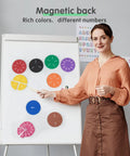 Teacher with Magnetic Fraction Tiles Circle Set For Kids, 51 Pieces Rainbow Math Manipulatives on a whiteboard in classroom