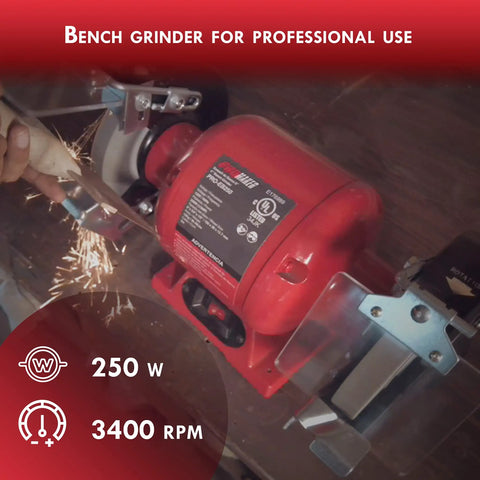 6-Inch Bench Grinder With Dual Eye Shields, 3400 RPM, 2.1A, 1/3 HP, shown grinding metal, with sparks visible.