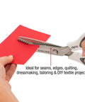 ProSeries 9 Inch Pinking Shears With No Fray Zigzag Edge Heavy Duty Stainless Steel Blades White Soft Grip Handle For Easy Pain-Free Fabric Cutting And Fray-Free Seams cutting red fabric