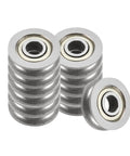 Heavy Duty U604ZZ U Groove Ball Bearings 4 By 13 By 4 mm Double Shielded ABEC One Metric Size 12 Pack stacked in silver.