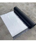 Heavy Duty Aluminum Foil Tape Self Adhesive Roofing Flashing Sealant Waterproof Underlayment Roll on a concrete surface showing reflective side.