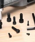 100 Pack Industrial Grade Rugged M4 X 14mm Full Thread Hex Socket Head Cap Screws And Bolts on wood surface with hex wrench.