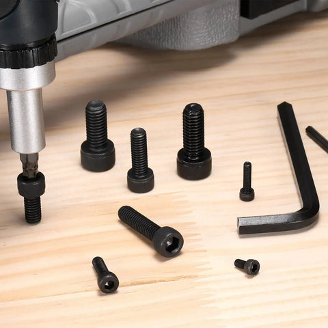100 Pack Industrial Grade Rugged M4 X 14mm Full Thread Hex Socket Head Cap Screws And Bolts on wood surface with hex wrench.