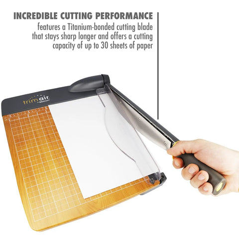 Person using Heavy Duty 12 Inch TrimAir Wood Guillotine Paper Cutter With 30 Sheet Capacity And Titanium Bonded Blade for paper trimming.