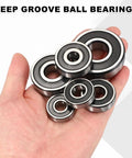 6208-2RS Deep Groove Ball Bearing 40x80x18 mm in hand, showcasing size and chrome steel with double rubber seal.