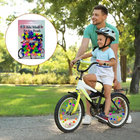 Father and son with bike using 72 Pack Colorful Bike Spoke Beads Kid Friendly Clip On Plastic Beads With Star And Round Shapes.