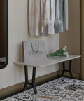 Side view of YCCO 15-inch black H-shaped metal table legs (2 pcs) supporting a white bench top