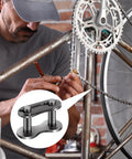 Man installing 5 Pieces Number 41 Roller Chain Connecting Links Heavy Duty Manganese Steel Master Connector on bicycle.