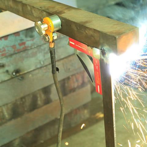 Magnetic Welding Ground Clamp With On Off Switch 40 Kg Pull 300 Amp Rated Ground Block in use during welding on metal beam