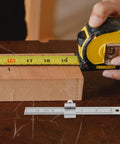 Stainless Steel Ruler With Clip Stopper, Precision Machinist Straight Edge next to tape measure on wood, clear accurate measurements.