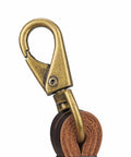 Close-up of clip on Leather Game Carrier Strap Belt With 12 Drop Slip Rings For Dove Duck Quail Pheasant And Other Small Game Bird Tote