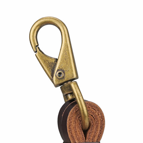 Close-up of clip on Leather Game Carrier Strap Belt With 12 Drop Slip Rings For Dove Duck Quail Pheasant And Other Small Game Bird Tote