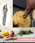 Stainless Steel Pineapple Eye Peeler and V Shape Cutter With Clip for Easy Eye Removal in use on a pineapple