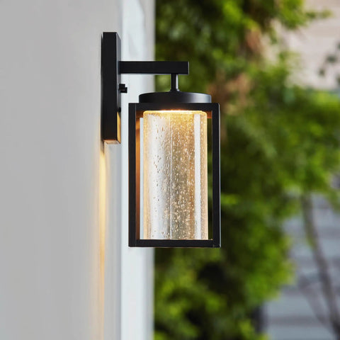 Capulet Amber Glass Center Column Outdoor Indoor Wall Sconce With LED Black Finish, Dimmable 12W 850 Lumens on wall