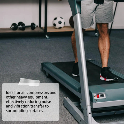 Close-up of a person using a treadmill showing Heavy Duty Anti Vibration Rubber Pads 4 Pack Shock Absorbing Base Mounts in use.