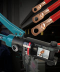 Close-up of 16 Ton Hydraulic Cable Lug Crimper Kit With 13 Die Sets for 9 AWG to 600 MCM Electrical Terminals in use.