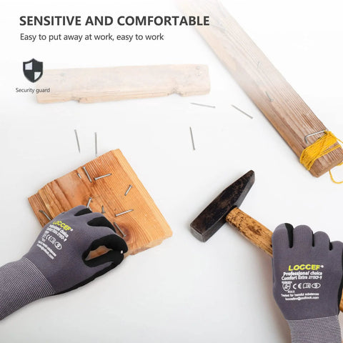 Front view of LOCCEF gray seamless knit work gloves with microfoam nitrile coating worn while hammering nails into wood
