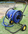 Heavy Duty Garden Hose Reel Cart With Smooth Rolling Wheels, ergonomic design, blue hose, assembled on grass, easy to use.