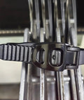 Heavy Duty Reusable Ratchet Cable Ties 12 Inch Grip Lock Straps with secure lock mechanism on metal surface.