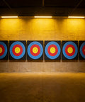 Backyard Archery Target For Youth, Kid Friendly EVA Foam displayed in a row indoors, featuring concentric circle patterns on target faces.