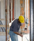 Rope Pulley Hoist System With Six To One Lifting Power And 2200 Pounds Breaking Strength Wooden Handle Construction worker using rope pulley hoist