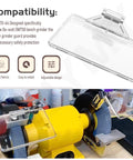 2 Pack Tough As Nails Bench Grinder Eyeshield Type 2 Safety Shield Replacement Cover For DW758 Workbench Tool placed on a yellow grinder.