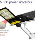 Heavy Duty Outdoor Solar Wall Light With Remote Control For Patios And Fences Dusk To Dawn Led Flood Light showing 5 LED power indicators.