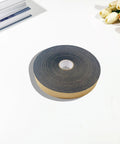 Heavy Duty Anti Squeak Tape For Queen Bed Slats 0.12 Thick X 1.18 Wide X 32.8 Ft roll on a white surface with flowers.