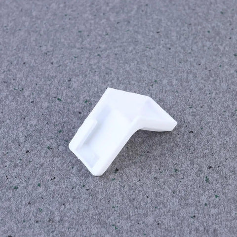 28 Pack White Plastic Corner Brackets For Furniture Reinforcement Anti Slip Desk And Chair Corner Braces on grey surface