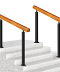 Adjustable Solid Wood Handrail For 3 To 4 Steps With Built Tough Floor Mounted Banister For Indoor Outdoor Decks Patios And Gardens Featuring Slick Finish And Killer Grip Support For Ultimate Deck Upgrade on a stairway.
