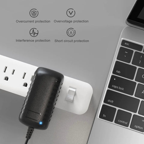 12V 2A Power Adapter For LED Strips And Small Electronics AC To DC Wall Plug With 2.1mm By 5.5mm Connector 8 Foot Cord connected to power strip