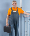 Man holding a Heavy Duty Black Polypropylene Toolbox Organizer With Reinforced Carry Handle And Tight Seal Lids For Sorting Hand Tools Fasteners And Workshop Gear That Is Built Different And Ready For Any Job Site.