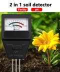 Two In One Compact Soil Fertility Tester With Three Probes Kit measuring soil near yellow flower in a garden