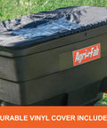 Tow Behind Lawn And Garden Broadcast Spreader With 185 Lb Capacity, showing close-up of hopper with vinyl cover.