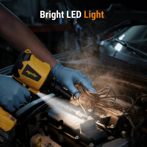 Cordless Air Duster And Blower Tool Only With 50,000 RPM Brushless Motor in use under car hood with LED light highlighting wires.