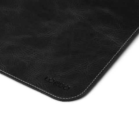 Corner detail of Top Grain Leather Extended Mouse Pad For Office And Gaming Large Desk Mat With Slick Writing Surface