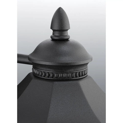 Top detail of Edition Collection 1-Light Outdoor Wall Lantern With Clear Water Glass Traditional Style Large 9 Inch Black Textured Finish
