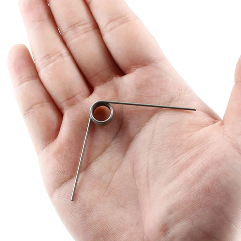 Hordion 2in stainless steel torsion spring, 1mm wire, 11mm outside diameter, 90-degree bend, held in hand