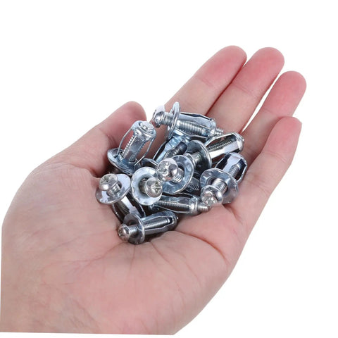 Hand holding 35 Piece Expansion Bolt Kit With Petal Shape Nuts M4 M5 M6 And Hollow Wall Anchors For Quick Easy Install And Strong Fastening In Plasterboard And Iron Skin For Home DIY Projects.