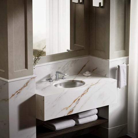 Bachata Stainless Steel 20 Inch Oval Lavatory Sink With Overflow Drop In Or Undermount Design Satin Finish Slick Curved Basin Durable Stainless Steel For Modern Bathrooms Easy To Clean And Install in a marble vanity setting