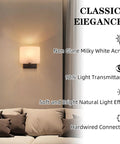 AuroraSpher Indoor Hardwired Modern Milky White Acrylic Black Wall Sconce illuminating a cozy living space.